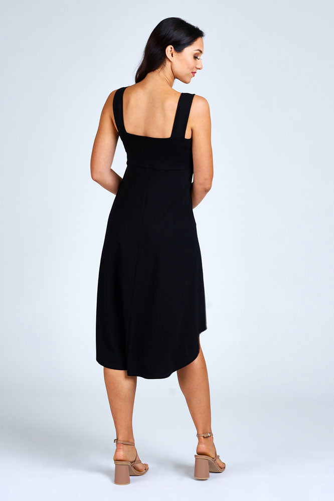 Woman wearing long black dress.