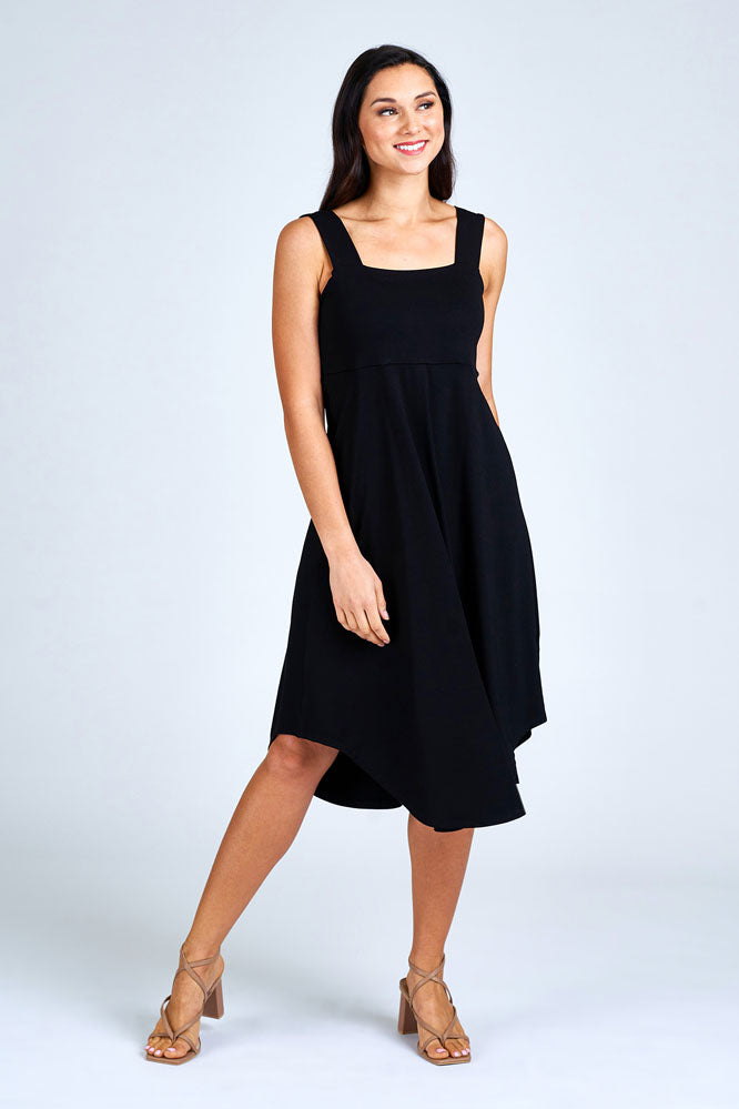 Woman wearing long black dress.