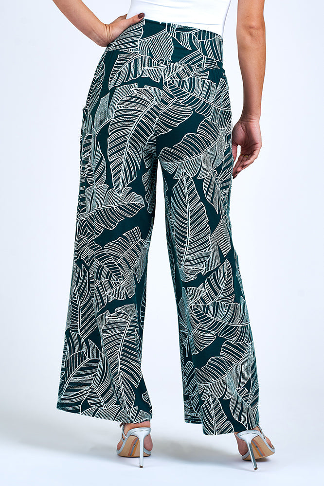 Woman wearing forest green pants.