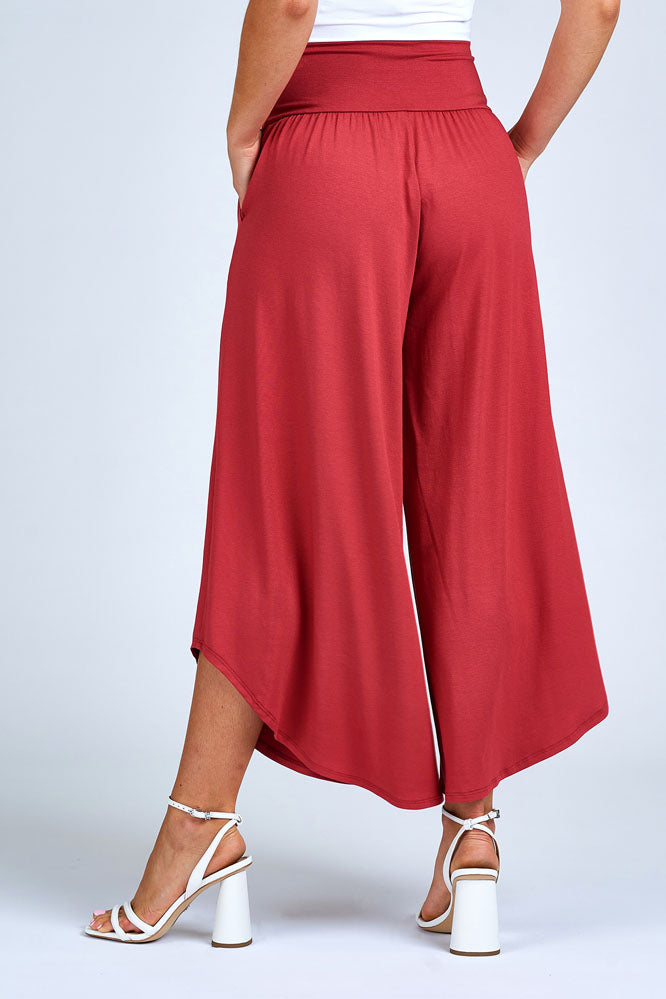 Woman wearing red pant.