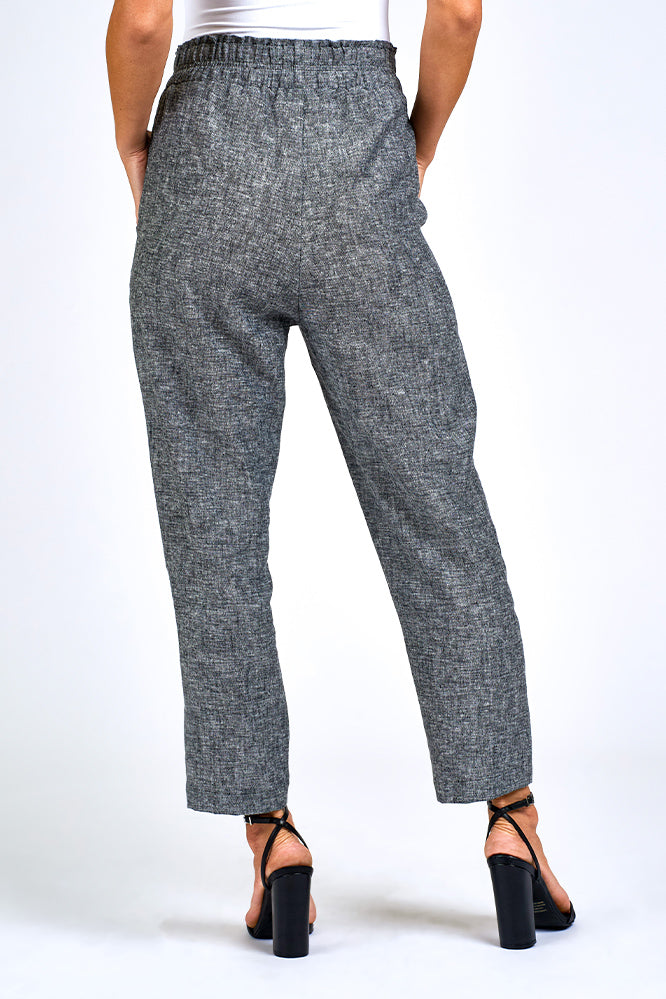 Woman wearing grey pants. 