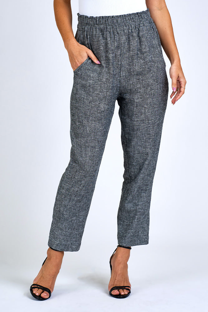 Woman wearing grey pants. 