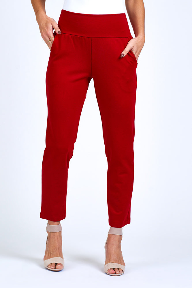 Woman wearing red pants.