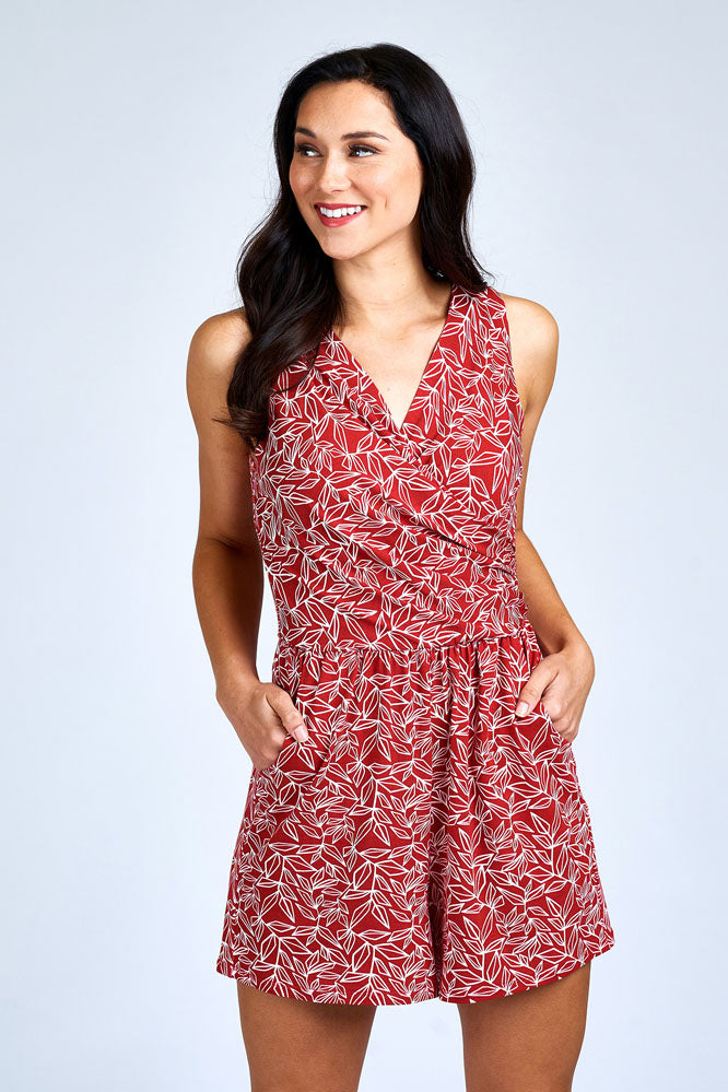 Woman wearing red romper.