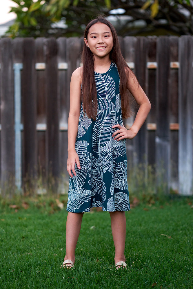 Girl wearing forest green dress.