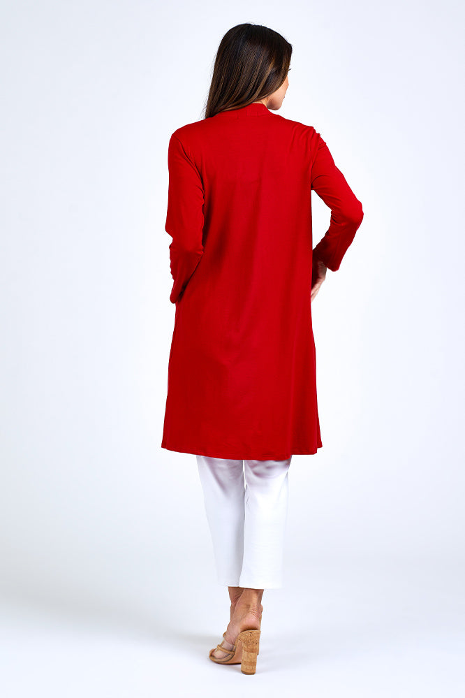 Woman wearing red long jacket.