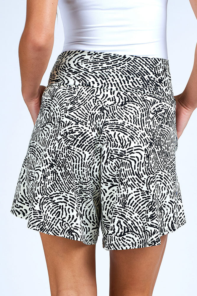 Woman wearing black and white skort.