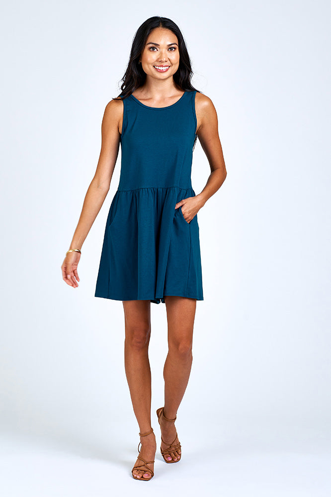 Woman wearing blue romper.