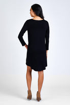 Woman wearing black dress.