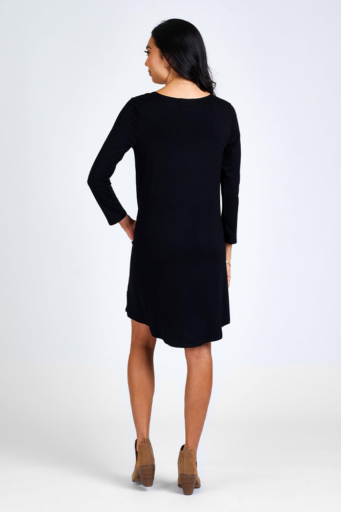 Woman wearing black dress.