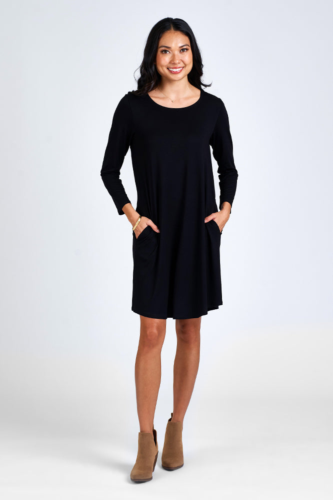 Woman wearing black dress.